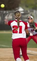 <b>Meghan McIntosh (21) throws to Michelle Mueller (12) at first base</b>