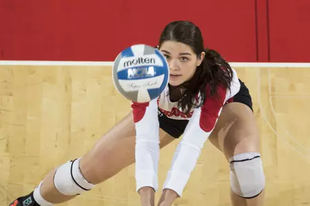 Wisconsin Badgers Deme Morales dives for a dig during an NCAA second round volleyball match against the Illinois State Redbirds Friday, December 5, 2014, in Madison, Wis. The Badgers won 3-0. (Photo by David Stluka)