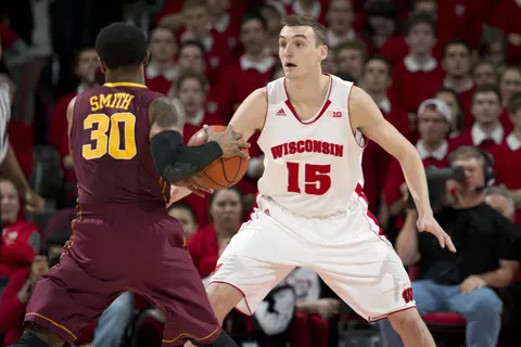 Sam Dekker (15) plays defense against the Minnesota Golden Gophers Thursday, February 13, 2014 in Madison, Wis. The Badgers won 78-70. (Photo by David Stluka)