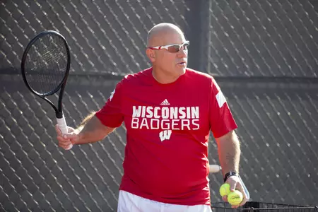Head coach Greg Van Emburgh instructs his players during a practice at the Nielsen Tennis Stadium Tuesday, September 16, 2014 in Madison, Wis. (Photo by David Stluka)