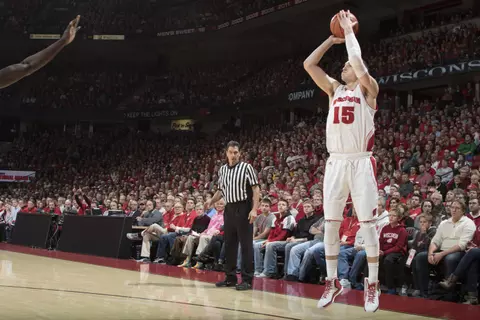 Wisconsin forward Sam Dekker (15) launches a three during the Badgers' game against Iowa at the Kohl Center on Jan. 20, 2015 (David Stluka photo)