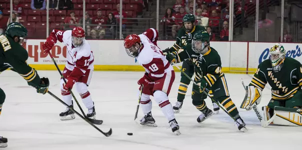 Seamus Malone plays the puck