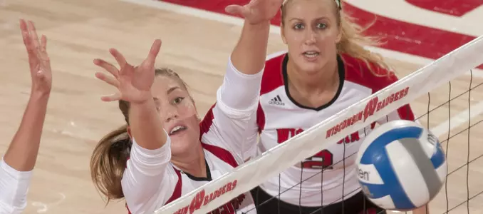 Haleigh Nelson blocks a Minnesota shot