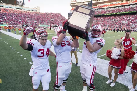 Derek Watt, Michael Deiter and Tyler Marz Freedom Trophy vs Nebraska