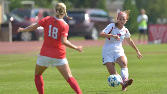 Holly Heckendorf kicks ball