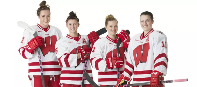 Lauren Williams, Jenny Ryan, Baylee Wellhausen, Sydney McKibbon with pink sticks
