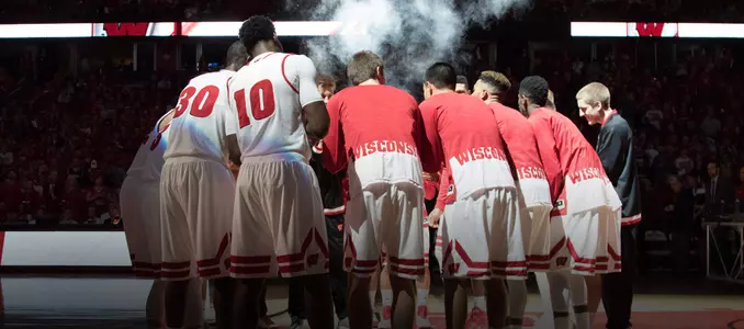 Men's Basketball Team Huddle