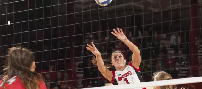 Lauren Carlini shoots a set to a teammate