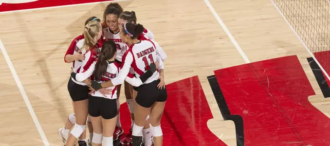 The Badgers celebrate on the court