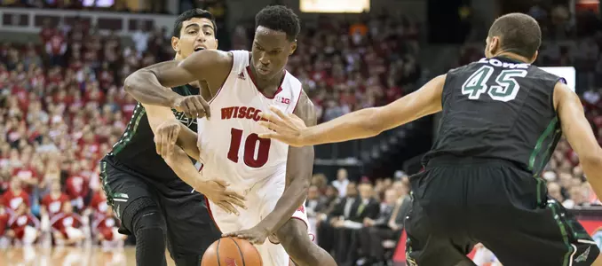 Nigel Hayes dribbles against Green Bay