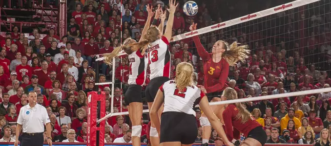 Kelli Bates and Haleigh Nelson block an Iowa State player.