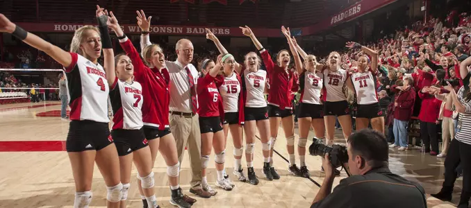 The Badgers sing Varsity on the court