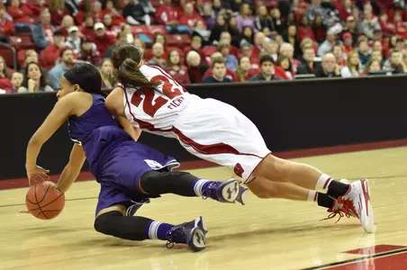 Junior Tessa Cichy hits the floor for a loose ball during the Badgers' game vs. Northwestern on Feb. 22, 2015. (Photo by Jack McLaughlin)