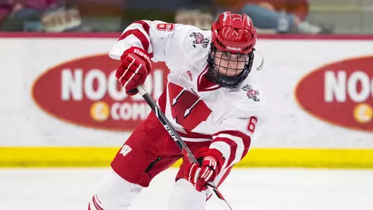Wisconsin Badgers Courtney Burke (6) passes the puck during an NCAA WCHA Conference women's hockey playoff game against the St. Cloud State Huskies Saturday, February 28, 2015, in Madison, Wis. (Photo by David Stluka)