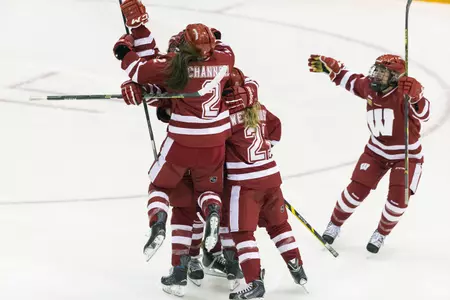 The Badgers celebrate Annie Pankowski's goal in their semfinal game against Minnesota on Friday, March 20, 2015 at Ridder Arena (David Stluka photo)