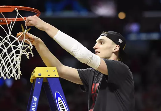 Wisconsin Badgers forward Sam Dekker (15) celebrates the 85-78 victory against Arizona Wildcats in the finals of the west regional of the 2015 NCAA Tournament at Staples Center. Mandatory Credit: Richard Mackson-USA TODAY Sports