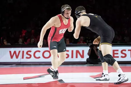 Eric Peissig faces Iowa's Nathan Burak at the Kohl Center!