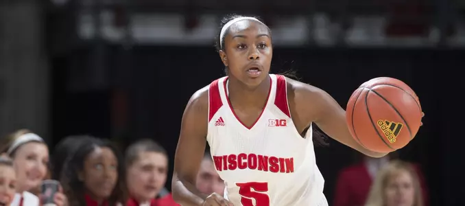 Roichelle Marble (5) dribbles down the court