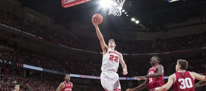 Ethan Happ drives against Indiana