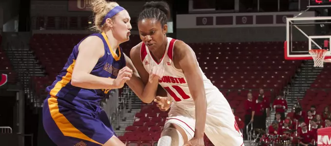 Marsha Howard drives around a defender