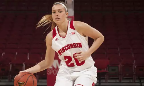 Taylor Kuhn dribbles the ball