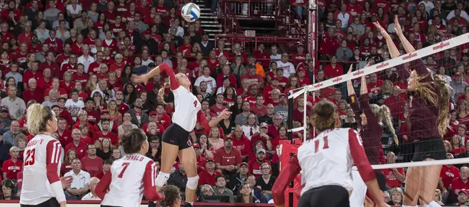 Kelli Bates goes up for a kill