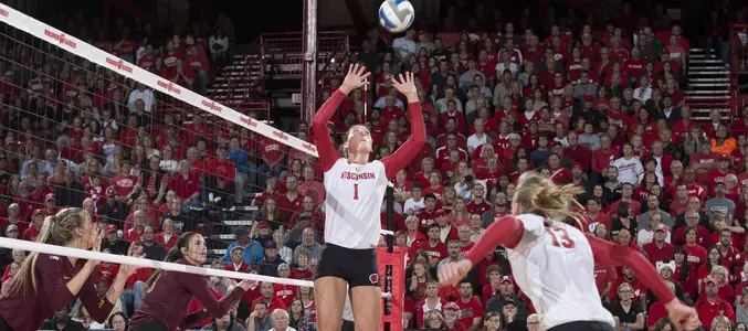 Lauren Carlini sets the ball