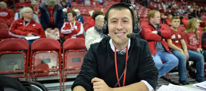 Jon Arias at women's basketball game