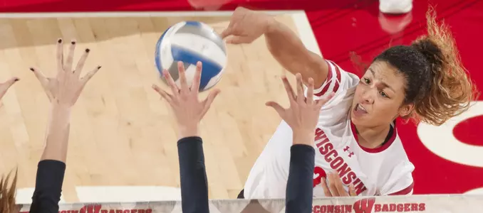 Lauryn Gillis goes up for a kill