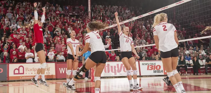The Badger team celebrates on the floor