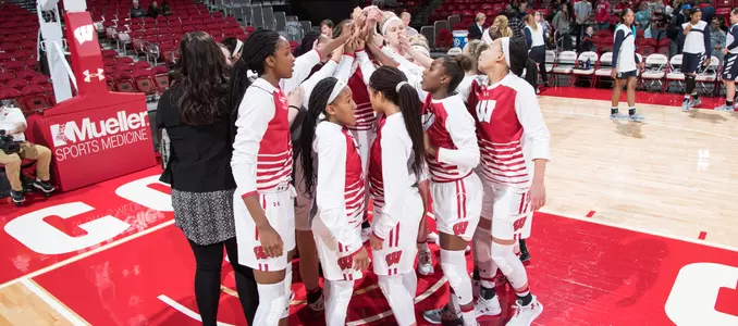 The team huddles prior game vs. Butler