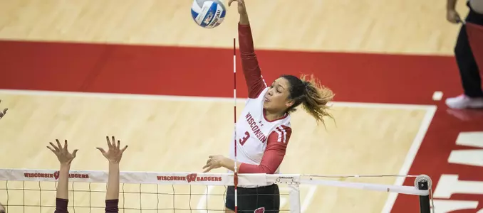 Lauryn Gillis goes up for a kill