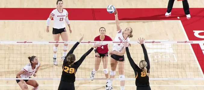 Haleigh Nelson goes up for a tip