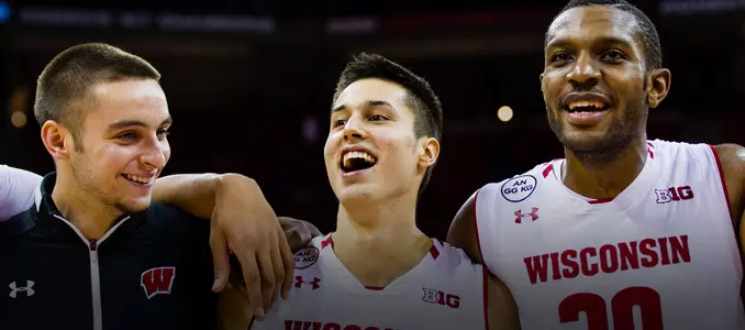Bronson Koenig, Vitto Brown and Michael Ballard sing Varsity after a win