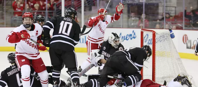 Men's hockey 2016 vs. Omaha celebration of Luke Kunin's goal