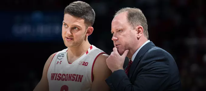 Greg Gard coaches Zak Showalter during a game