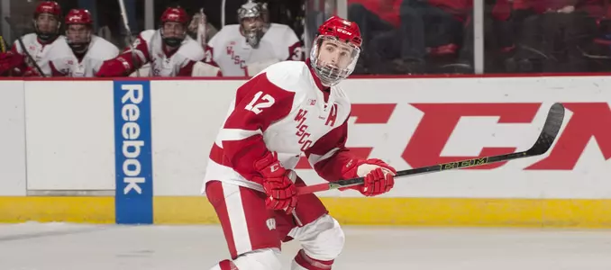 Besse carrying the puck vs. NMU
