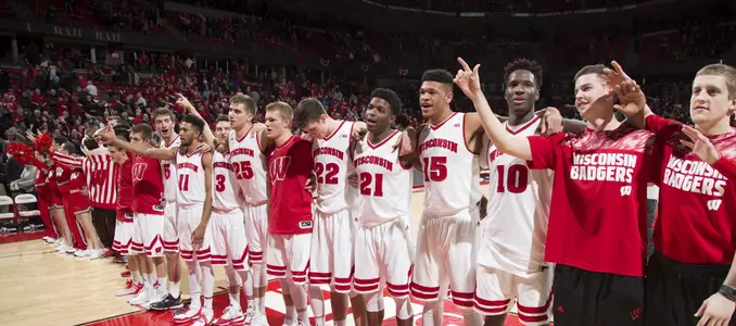Me's basketball team sings Varsity after defeating Indiana at the Kohl Center (Jan. 26, 2016)