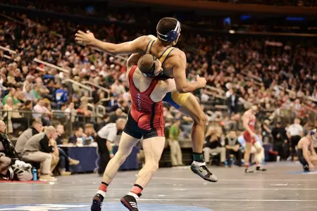 Isaac Jordan tosses his opponent for a takedown.