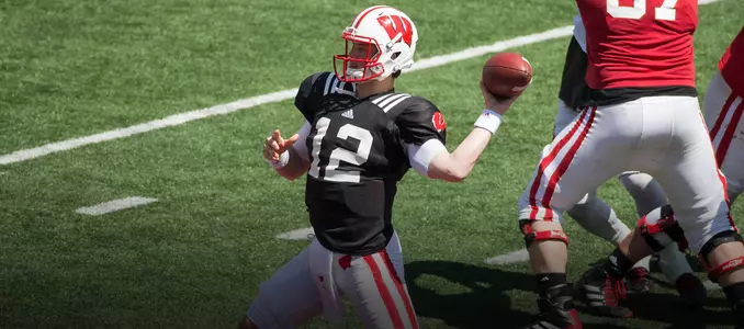 Alex Hornibrook throws during the spring game