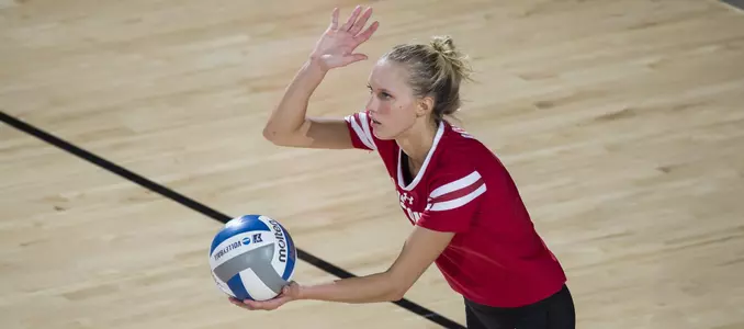 Kelli Bates serves up the ball