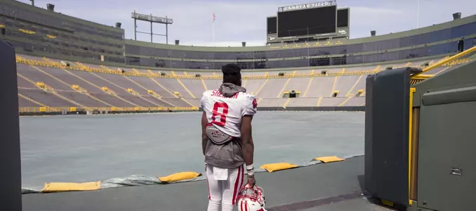 Sojourn Shelton looks out at Lambeau Field (