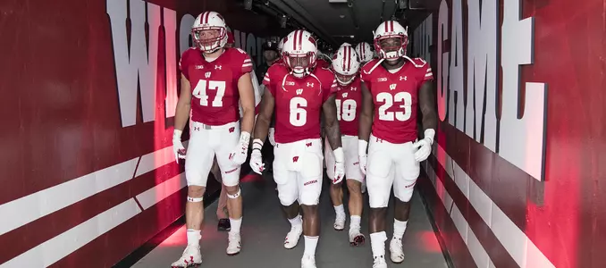 Vince Biegel, Corey Clement, Dare Ogunbowale tunnel walk vs. Akron - 2016