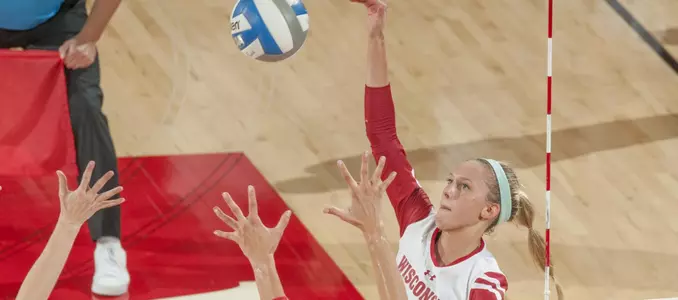 Kelli Bates goes up for a kill