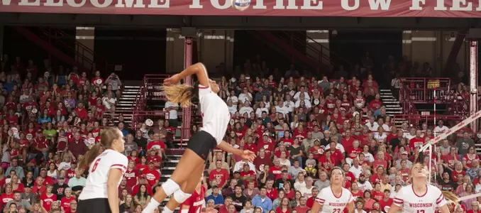 Lauryn Gillis hits out of the back row