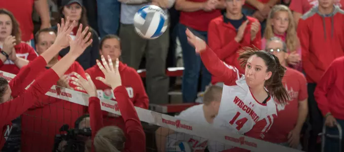 Madison Duello attacks the ball against to Nebraska blockers