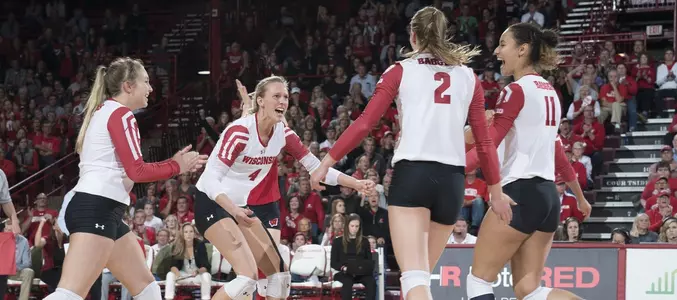 The Badgers celebrate winning a point during the match vs. Nebraska.
