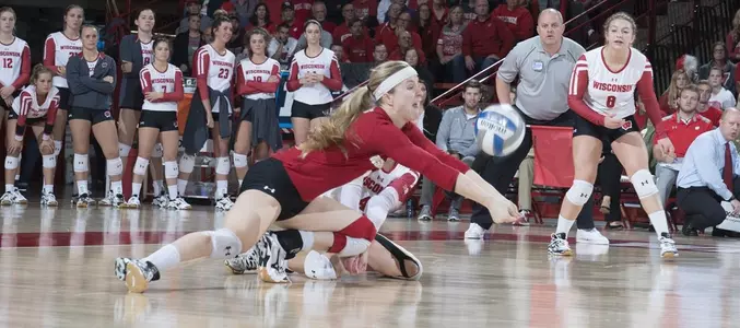 Tiffany Clark and Kelli Bates collide while going for a ball.