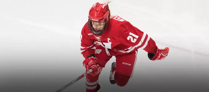 Baylee Wellhausen races to the puck