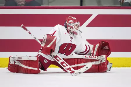 Alyson Baldwin Stretches in warm ups